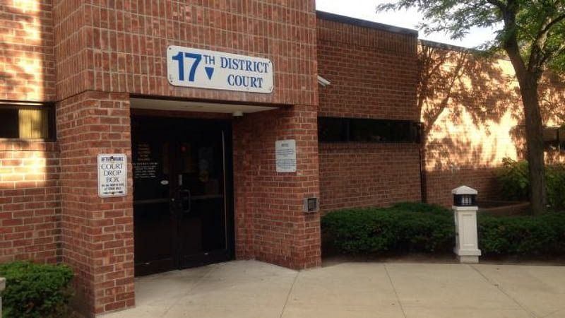Brick building with sign reading 