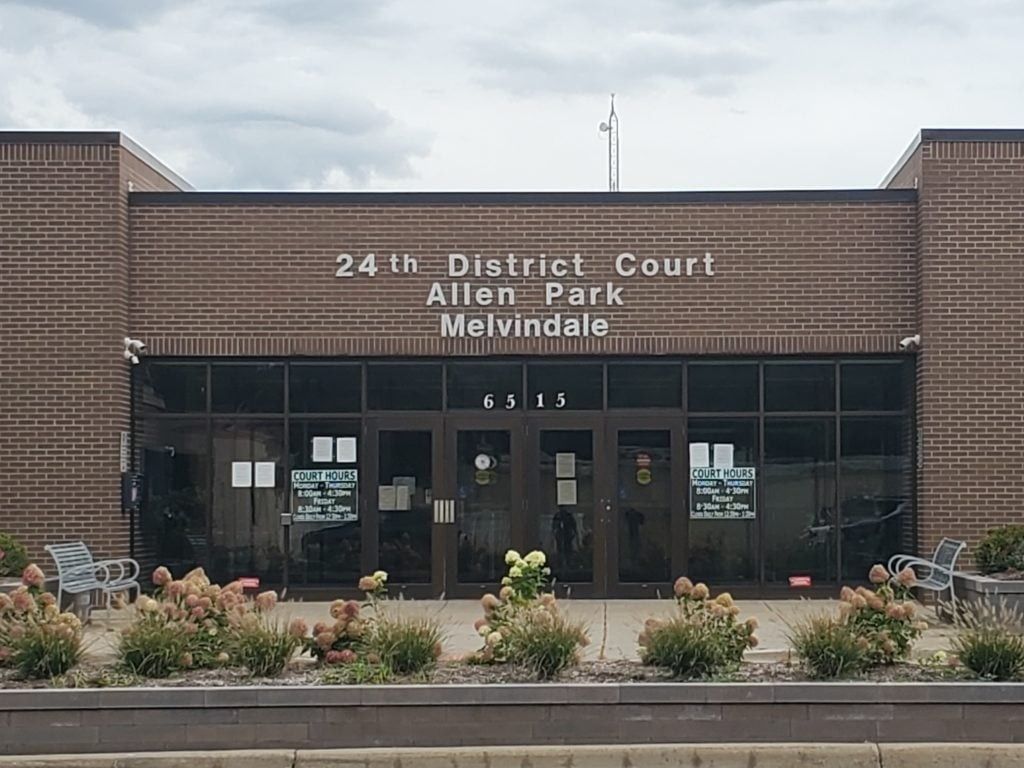 24th District Court, Allen Park, Melvindale. Brick building with glass doors, signs, and landscaping.