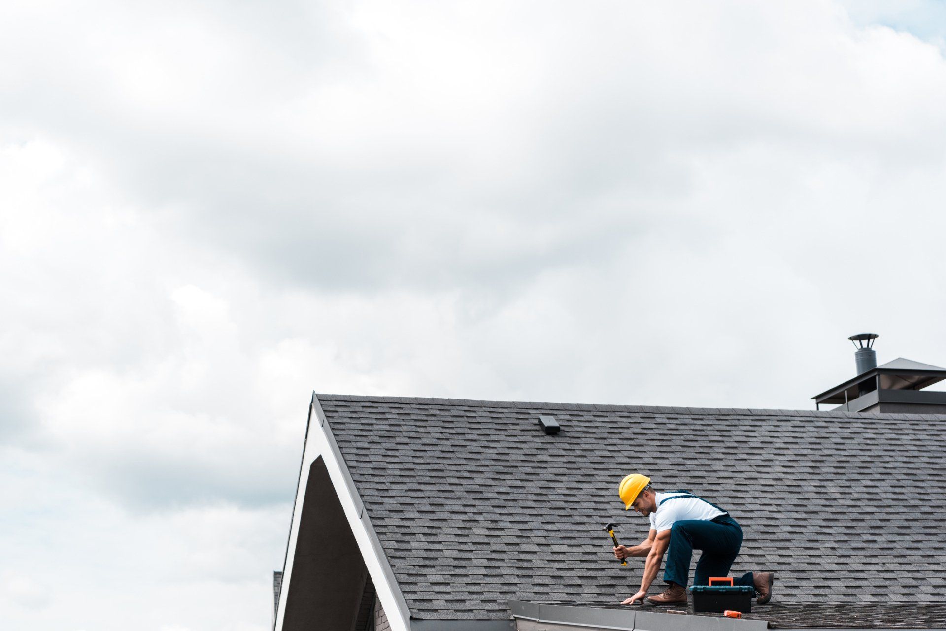 Repairman repairing roof — Benton, AR — Advanced Roofing