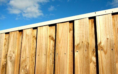 tall wooden fence