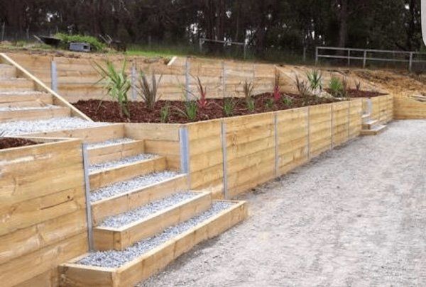 retaining walls with flower beds and stairs