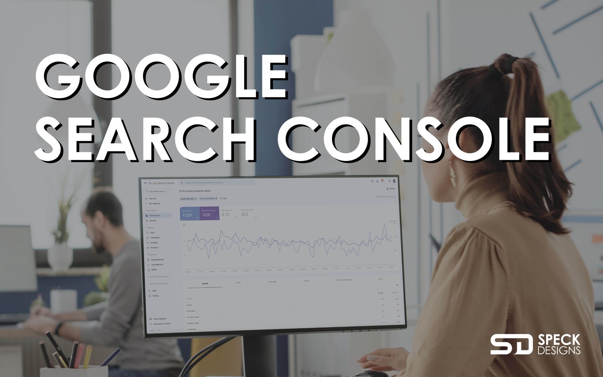 a woman is in front of a computer monitor that displays Google Search Console analytics.