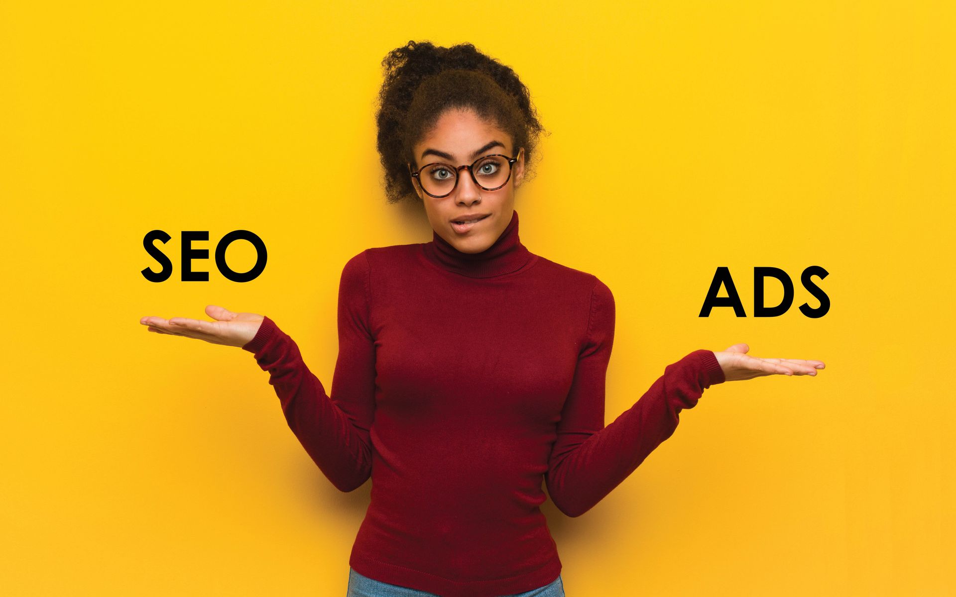 A woman is holding up her hands to choose between seo and ads.