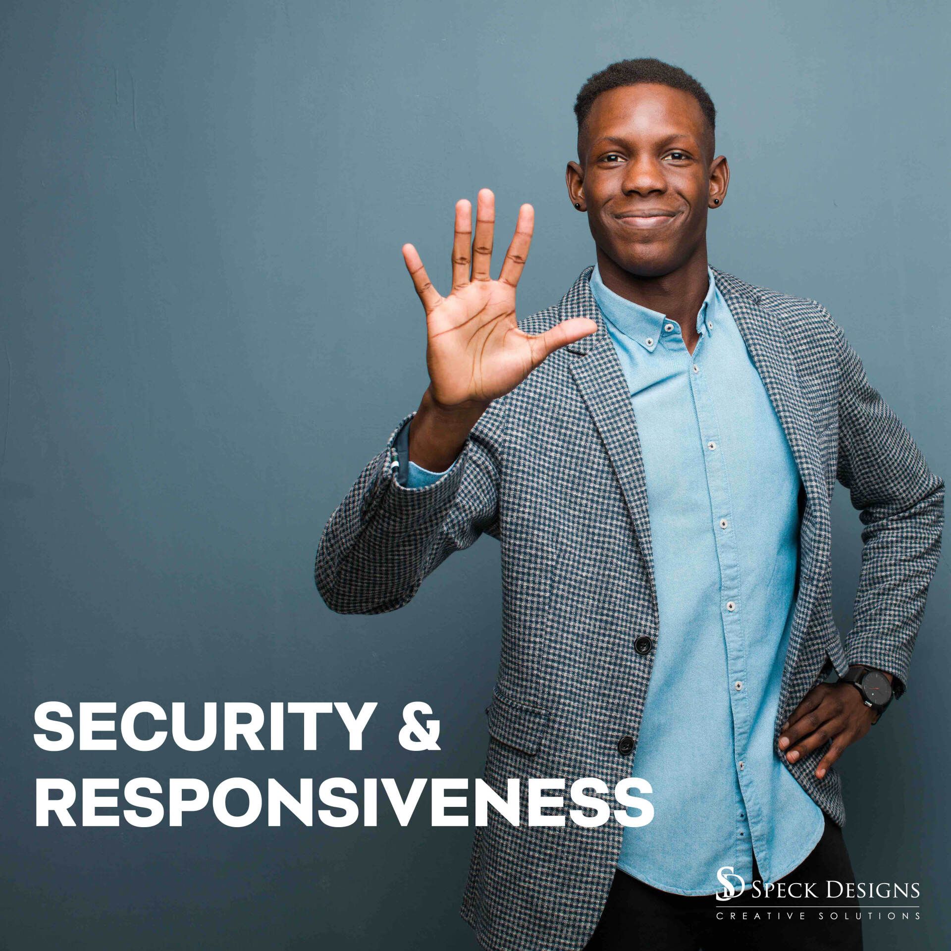 A man in a suit and blue shirt is giving a high five