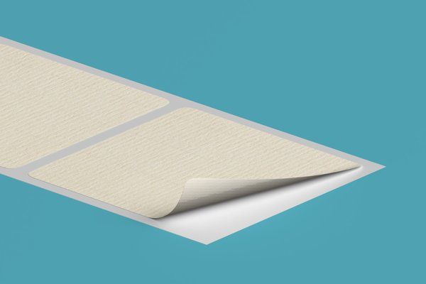 A close up of a piece of paper on a blue background.