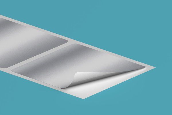 A close up of a piece of paper on a blue background.