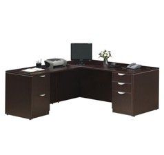 L-shaped dark brown office desk with drawers, computer, printer, phone, and flower arrangement.