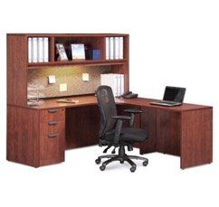 L-shaped office desk with hutch, cherry wood finish, black office chair, laptop.