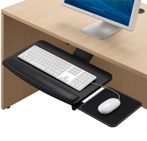 Black under-desk keyboard tray with white keyboard, mouse, and wrist rest. Attached to a wooden desk.