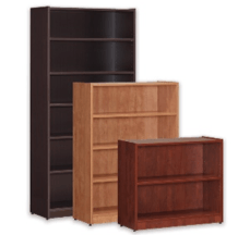Three wooden bookcases of varying heights and colors.
