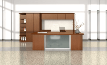 Wooden office desk and storage unit in a bright, modern office.