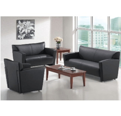 three leather sofas of different sizes around a coffee table
