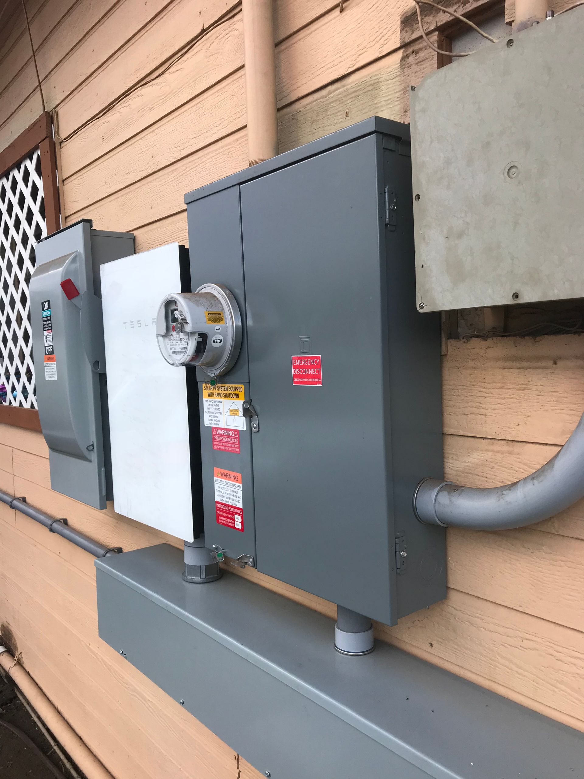 Tesla Battery on the Side of the House – Puunene, HI - Hawaii Electrical Solutions LLC