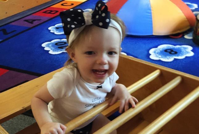 Baby girl in the playroom — Naples, FL — Whiz Kids