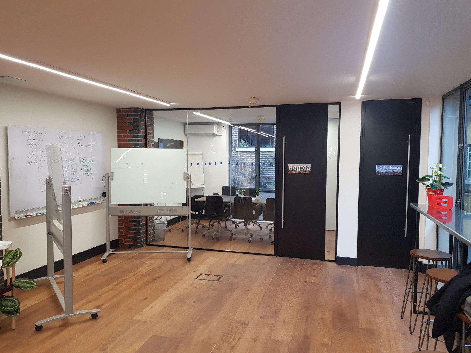 There is a whiteboard in the middle of the room.