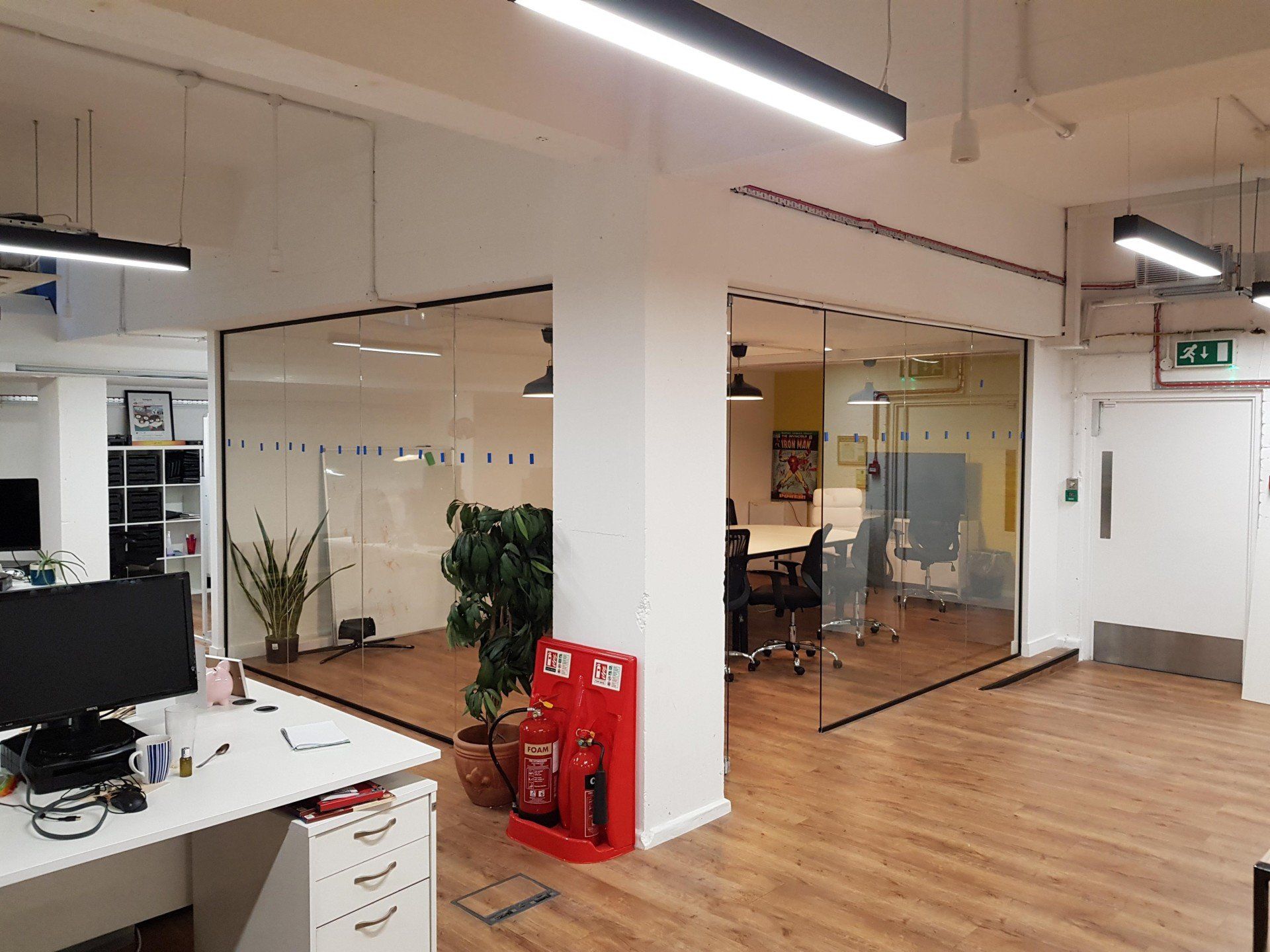 There is a fire extinguisher in the middle of the room.