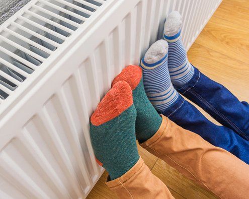 Electric Heater At Home — Moline, IL — Erickson Plumbing & Heating