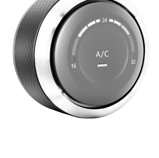 A close up of an a/c knob on a white background | Wind River Auto & Diesel