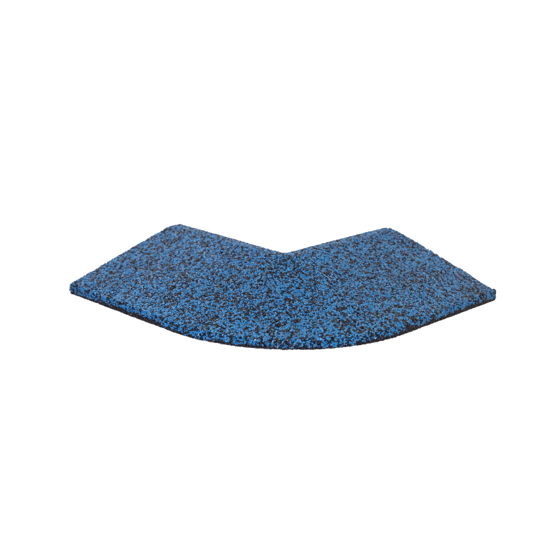 A piece of blue carpet is sitting on a white surface.