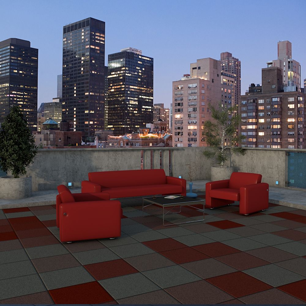 A patio with a couch and chairs with a city skyline in the background