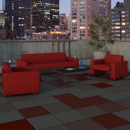 A couch and two chairs on a tiled floor with a city in the background