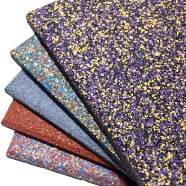 A stack of rubber mats of different colors are stacked on top of each other.