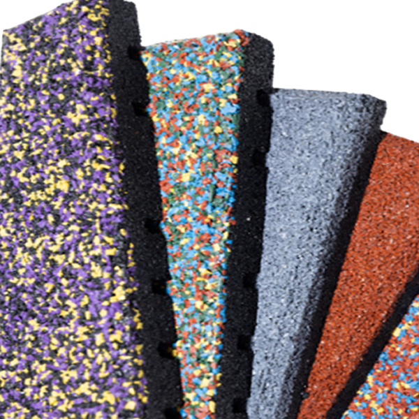 A bunch of different colored rubber mats are stacked on top of each other.