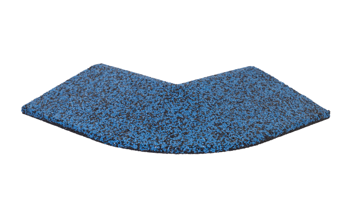 A piece of blue carpet is sitting on a white surface.