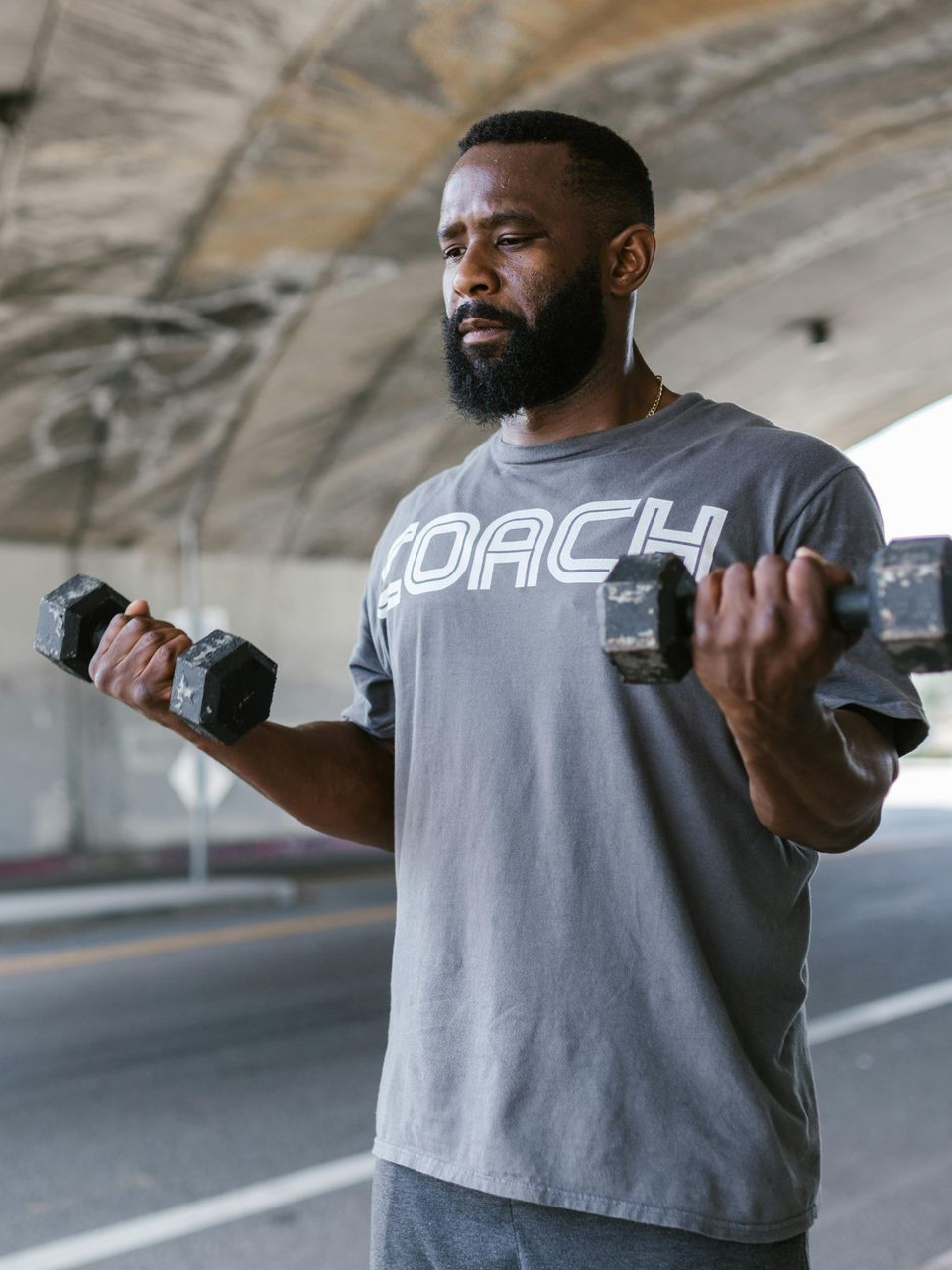 A person wearing a gray 