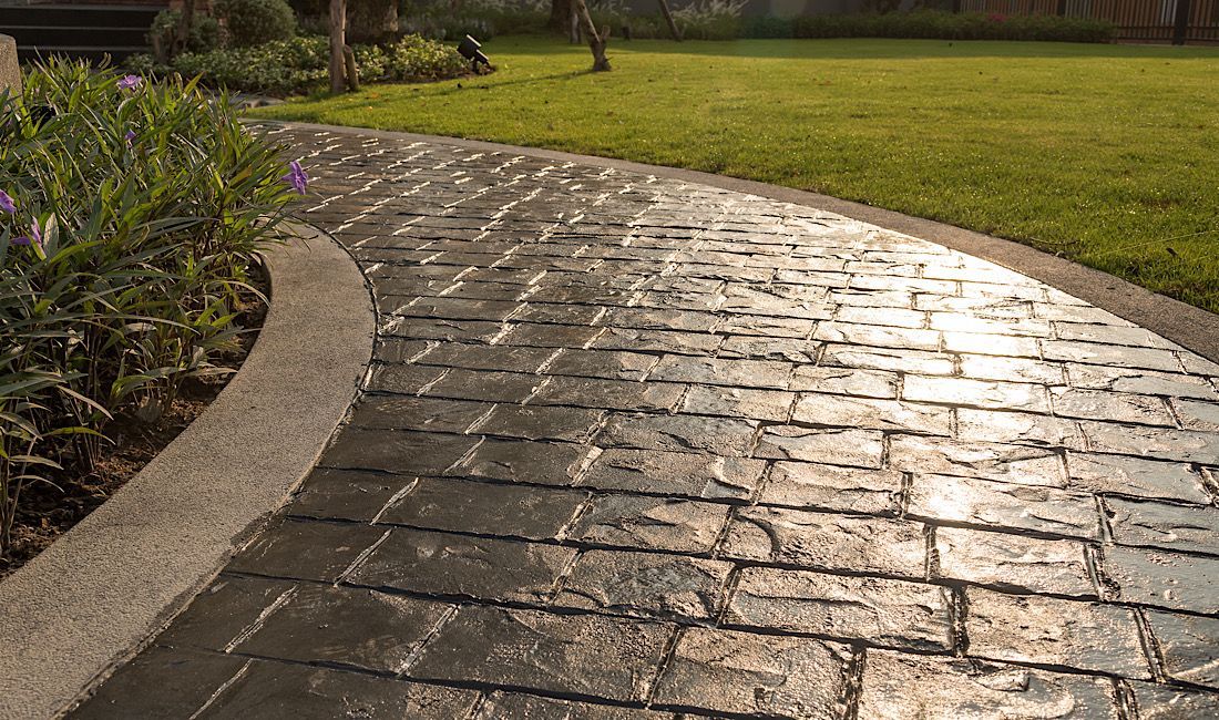 Beautiful stamped concrete walkway leading up to home in Denver, CO.