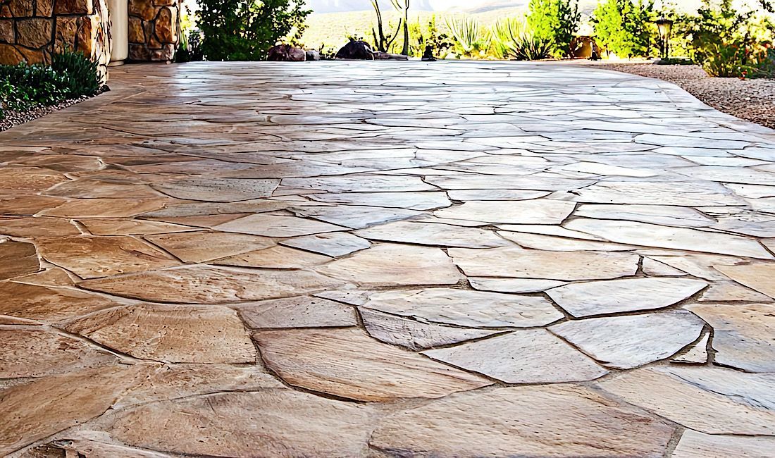 Boosting property value with beautiful and elegant stamped concrete walkway in Denver, CO.