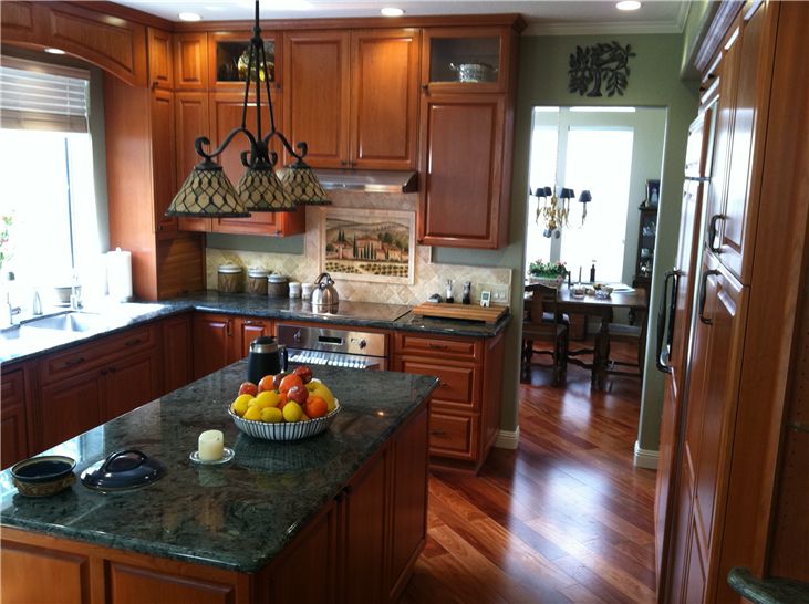 Interior kitchen with stained wood custom cabinets