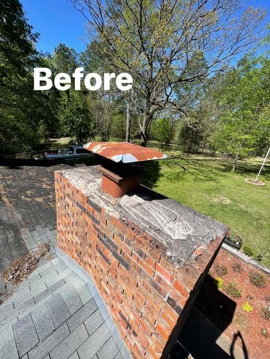 Brick chimney with rusted cap on a house roof, labeled 