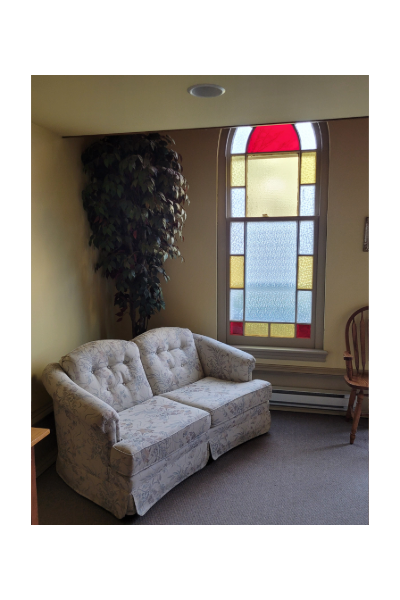 This is a photograph of seating near the elevator.