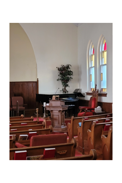 This is a photograph of the pulpit and the grand piano.