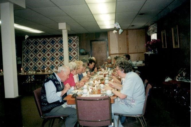 A photo of people sharing a meal.
