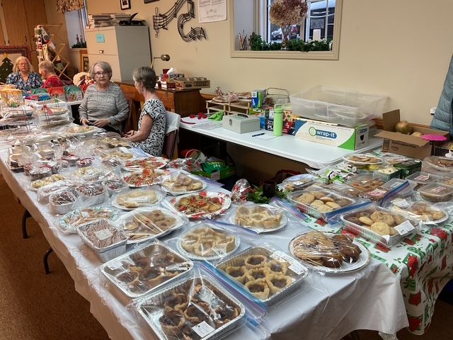 This is a photograph of baked good for sale at a bazaar.