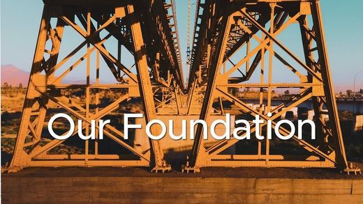 This is a photograph of a huge machine with OUR FOUNDATION written across it.