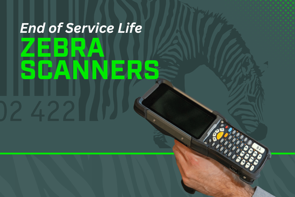 A person is holding a zebra scanner in their hand.