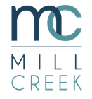 A logo for mill creek is shown on a white background.