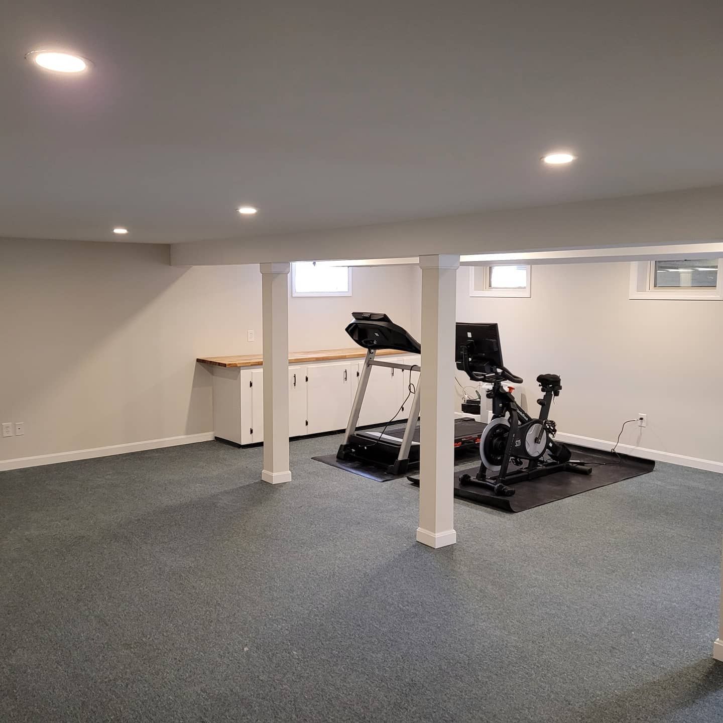 There is a treadmill and a bike in the basement.