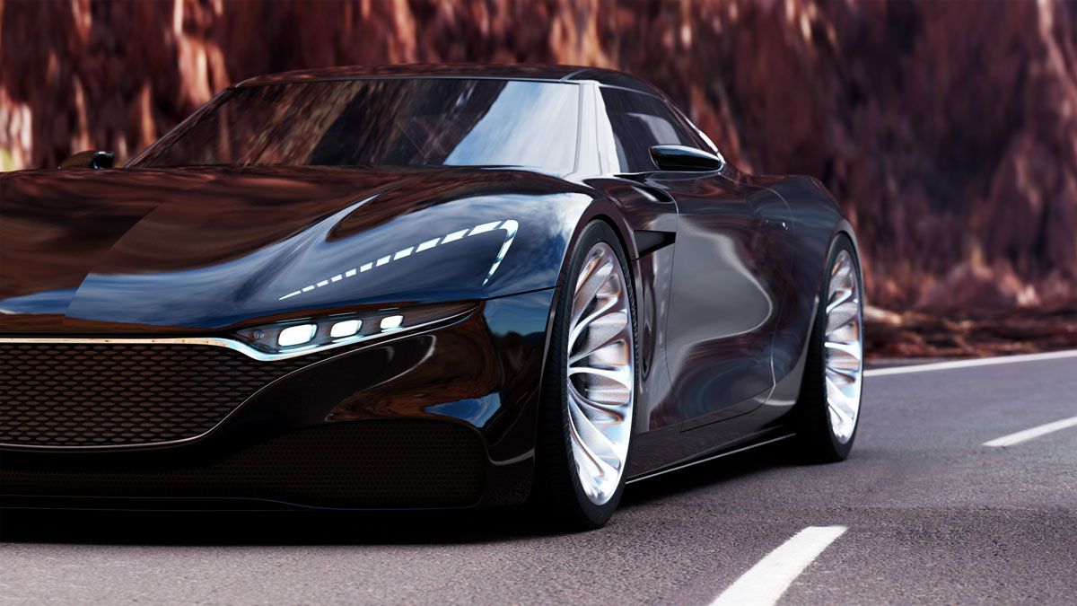 Sleek black sports car on a mountain road with red-brown cliffs in the background.