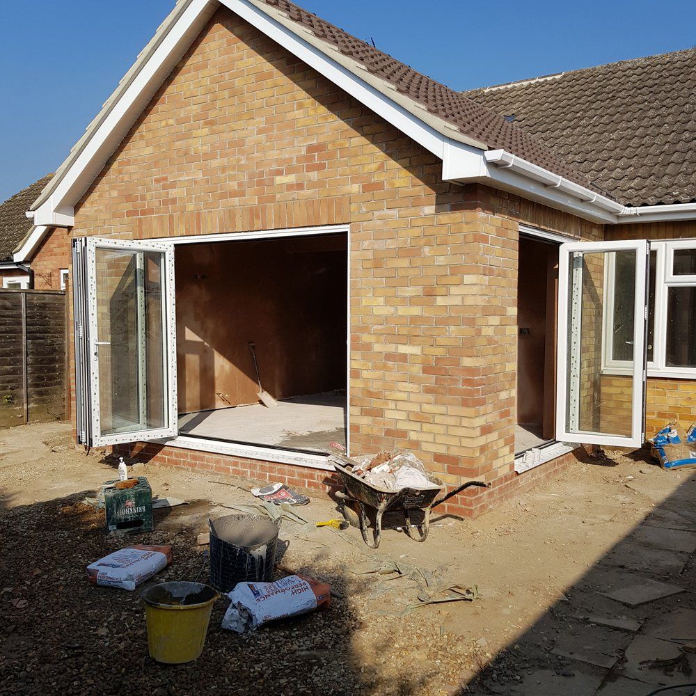 Property extension being built with patio doors