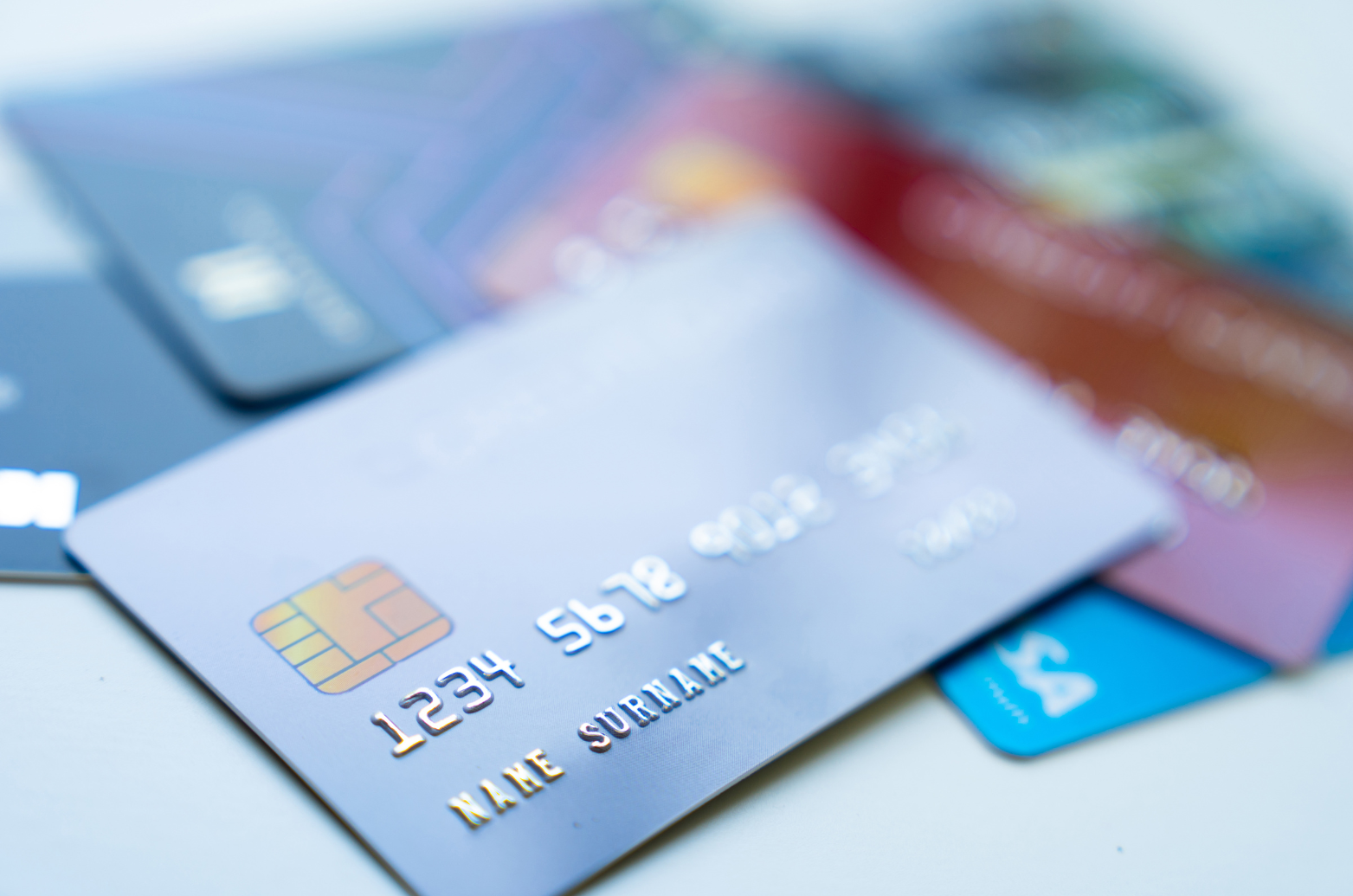 A close up of a credit card with the number 1234 on it