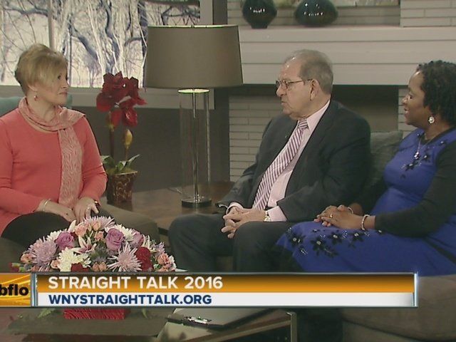 A man and two women are sitting on a couch talking about straight talk 2016