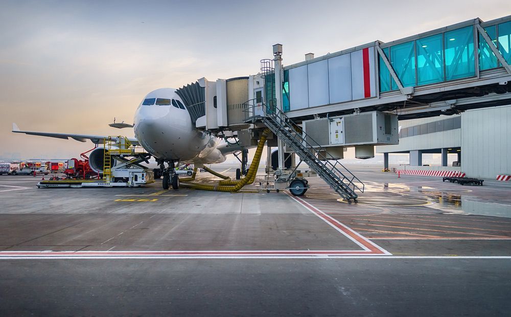A Large Passenger Jet Is Parked on The Tarmac at An Airport — Top End Line Markers Pty Ltd in Katherine, NT