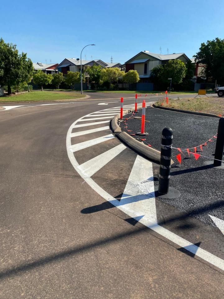 A Roundabout with A White Line Painted on The Side of It — Top End Line Markers Pty Ltd in Katherine, NT