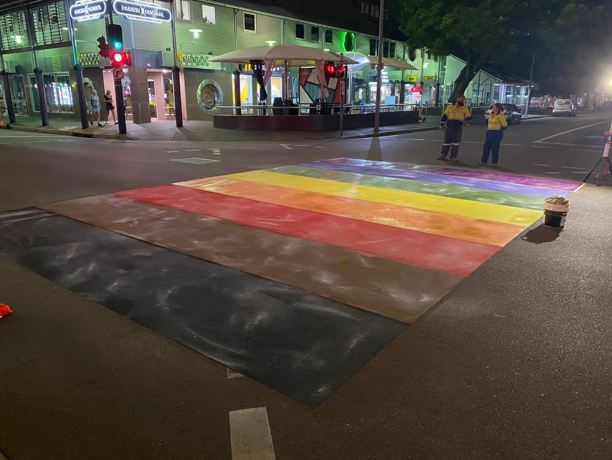 A Rainbow Crosswalk Is Painted on The Side of The Road at Night — Top End Line Markers Pty Ltd in Katherine, NT