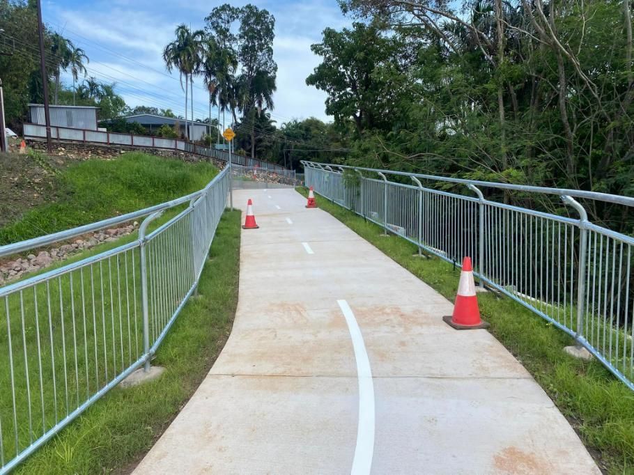 A Concrete Path with A Fence and Cones on It — Top End Line Markers Pty Ltd in Katherine, NT