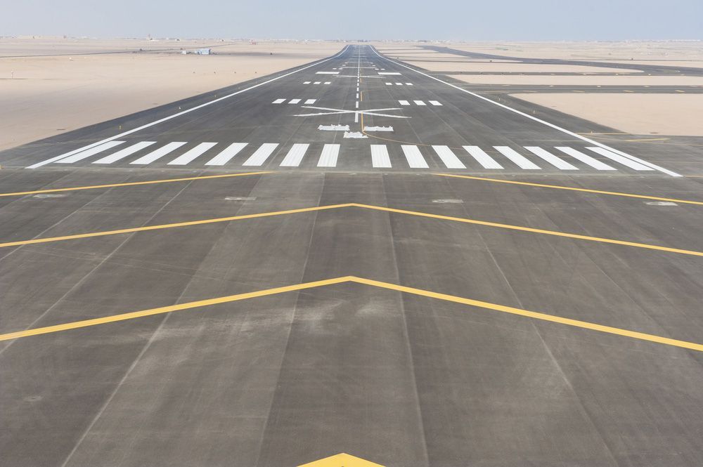 A Runway with A Yellow Arrow Pointing to The Right — Top End Line Markers Pty Ltd in Katherine, NT